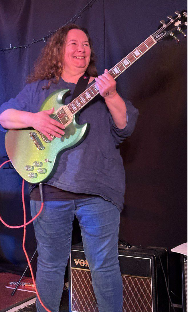 the band on stage in March 2024